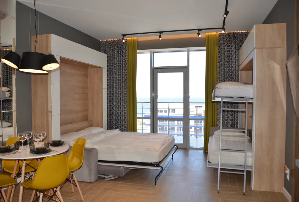 Апартаменты с видом на морской закат и бассейн