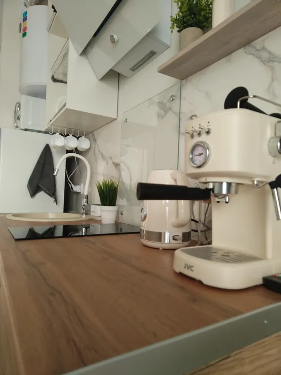 Студия комфорт с видом на горы и бассейнами во дворе