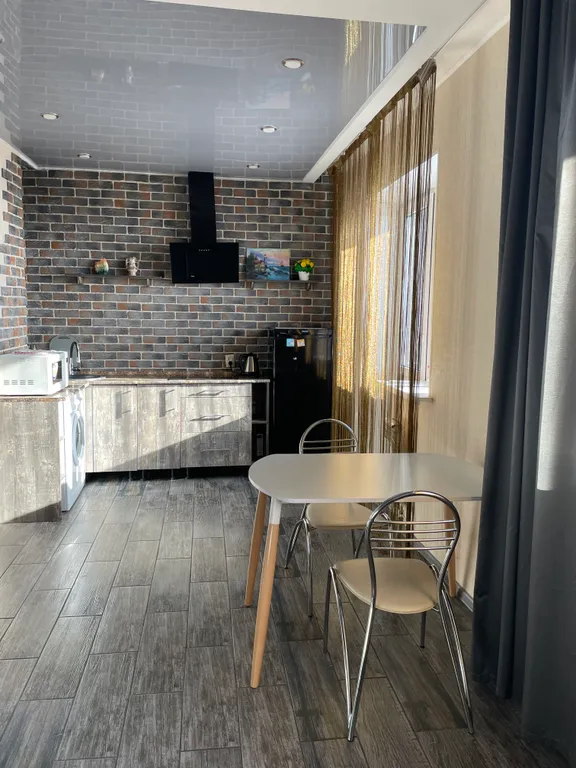 Студия в стиле лофт с видом на Волгу