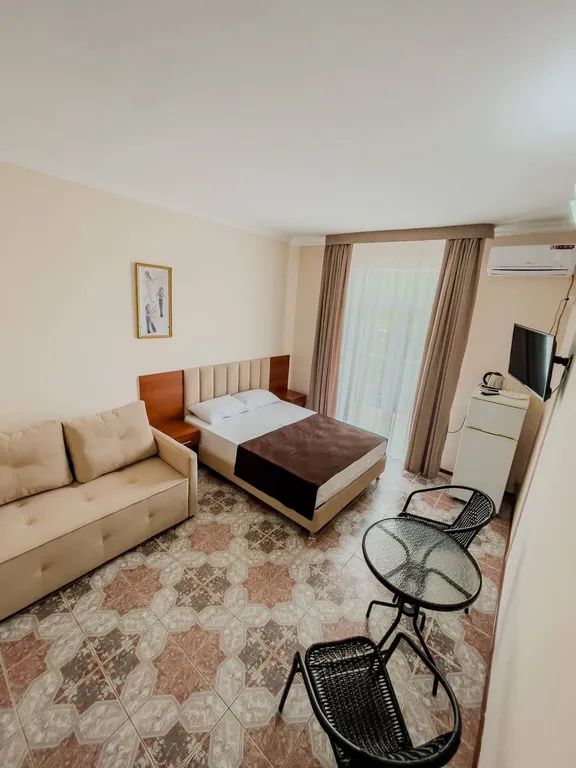 Трехместный номер с балконом