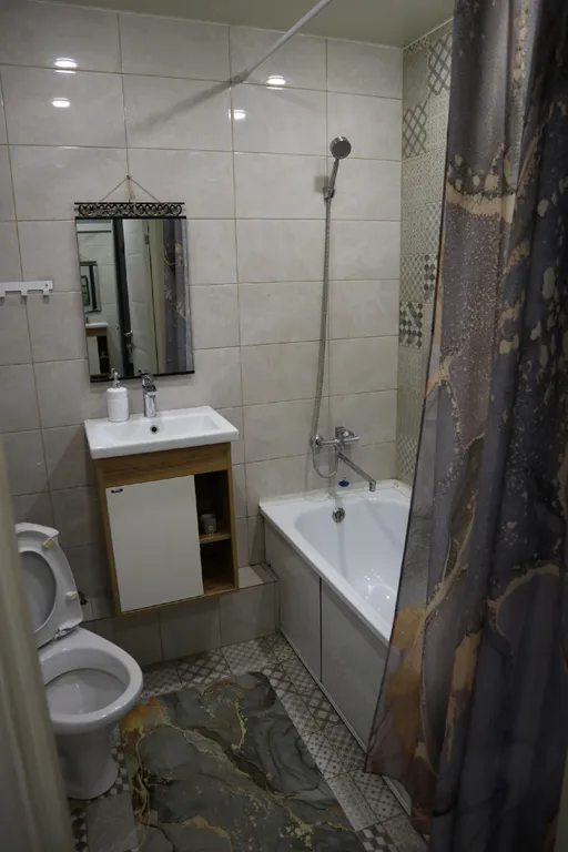 Квартира Уютная студия — Тюмень