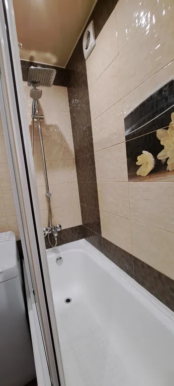 Уютная трехкомнатная квартира с обеденной зоной и двумя спальнями