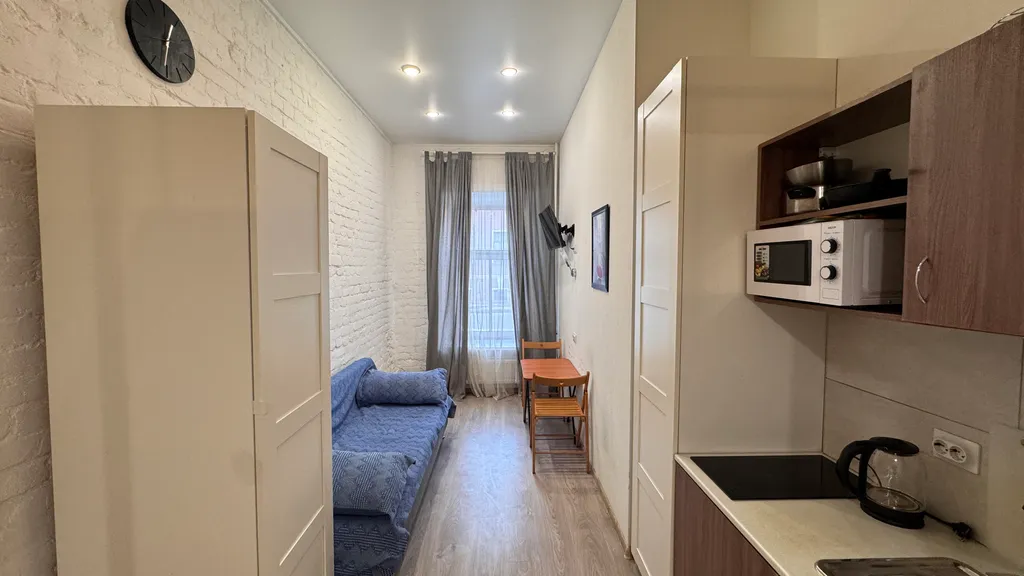 Двухуровневая квартира-студия в центре города