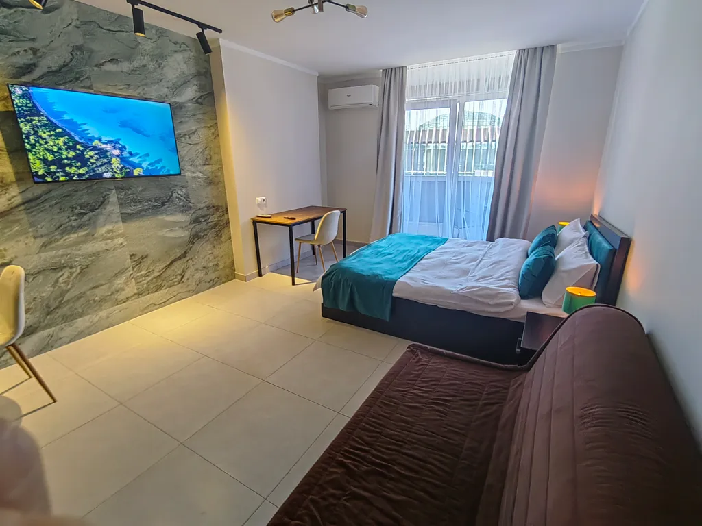 Квартира Квартира Большая студия с балконом и видом на море. 425 — Батуми