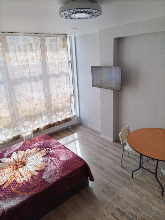 Уютная студия в центре города с видом на город