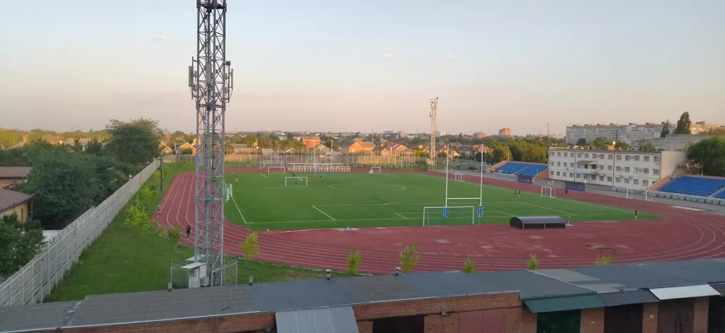 Уютная студия с видом на городской стадион Авангард