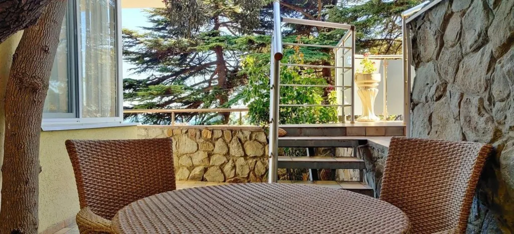 Апартамент с видом на море и отдельной спальней 202