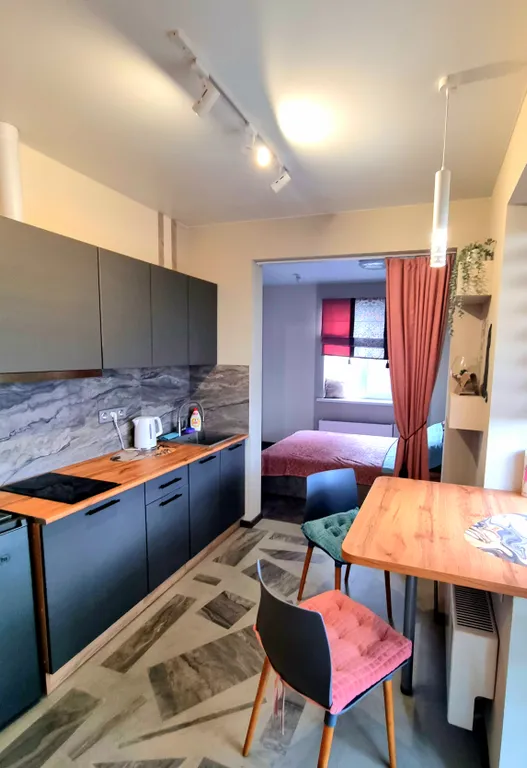 Квартира Уютная студия в сердце города на 13 этаже с панорамным видом — аренда посуточно в Томск