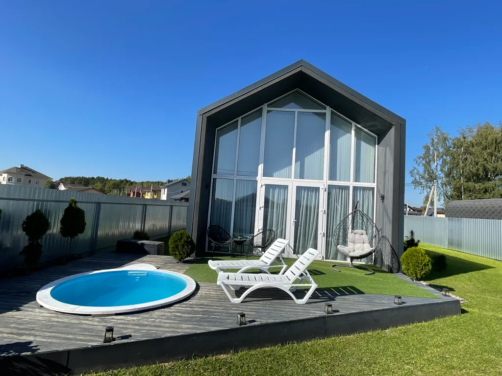 Дом в стиле БарнХаус с тёплым бассейном