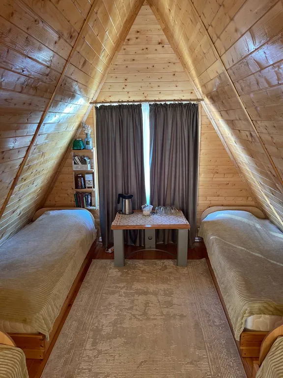 Уютная спальня на мансарде