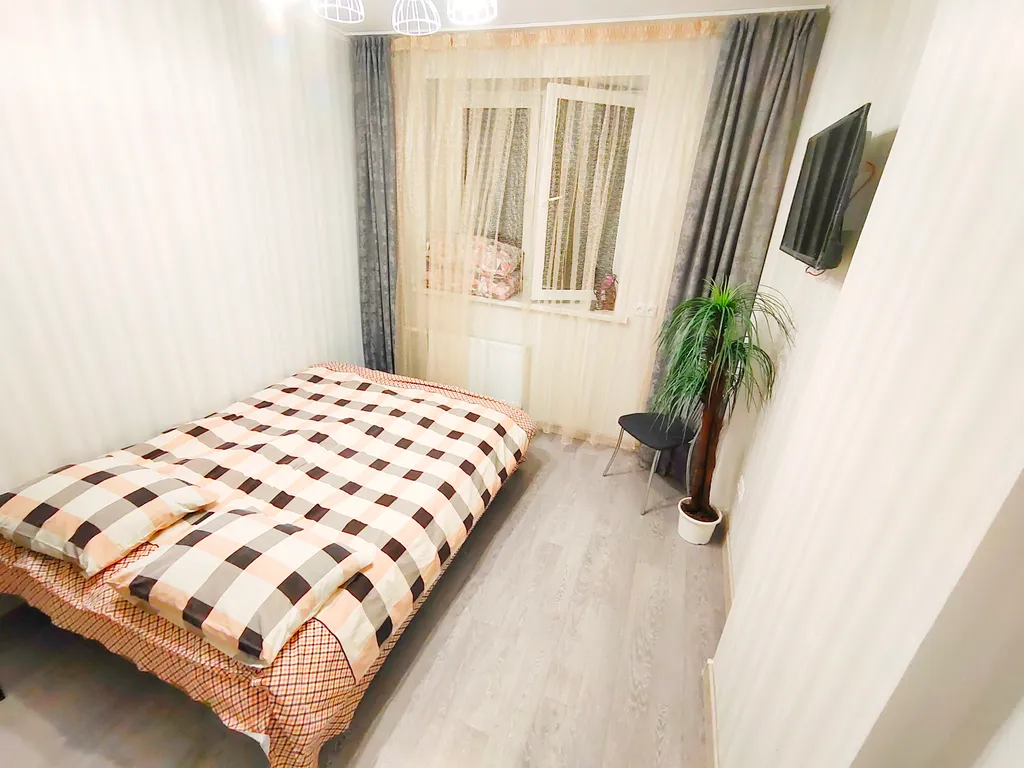 Светлая квартира с видом на рощу