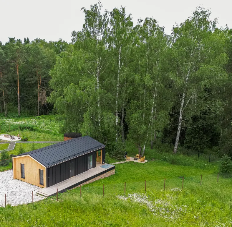 Атмосферный дом с баней в лесу