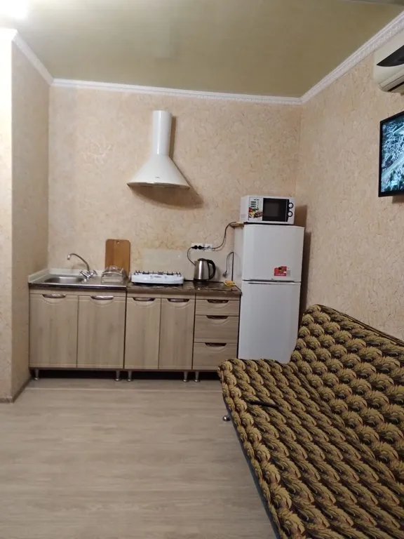 Номер на первом этаже двухэтажного, отдельностоящего дома