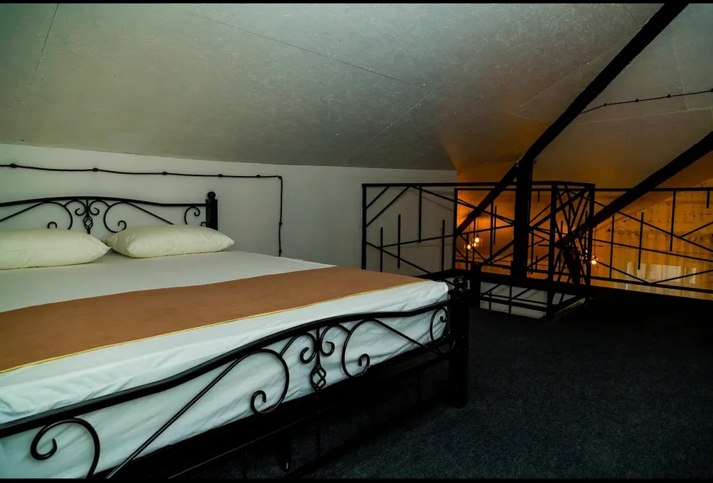 Двухуровневые апартаменты с отдельной спальней