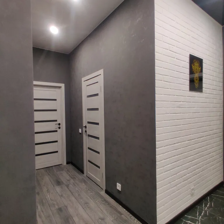 Дизайнерская и просторная квартира недалеко от центра