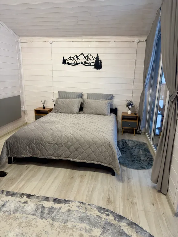 Коттедж Коттедж Уютный барнхаус с большими панорамными окнами — Архыз