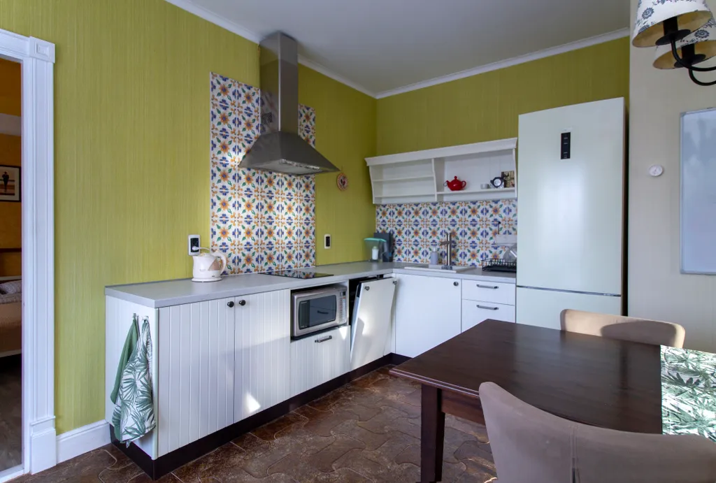 Уютная и просторная квартира с отдельной спальней и гостиной-кухней