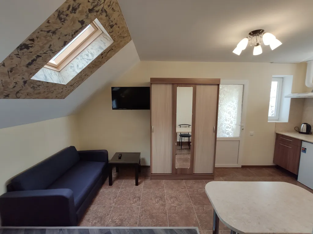 Квартира Уютная комната-студия с видом на сад — Севастополь