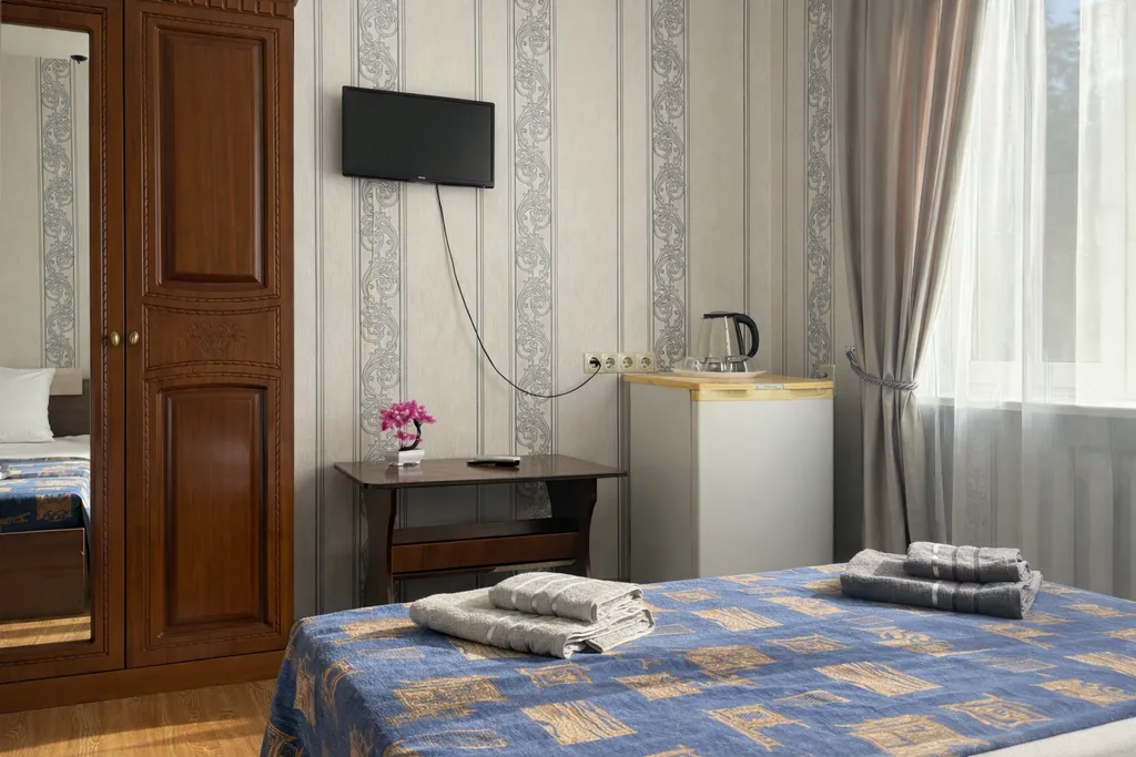 Трёхместный номер с собственной ванной комнатой