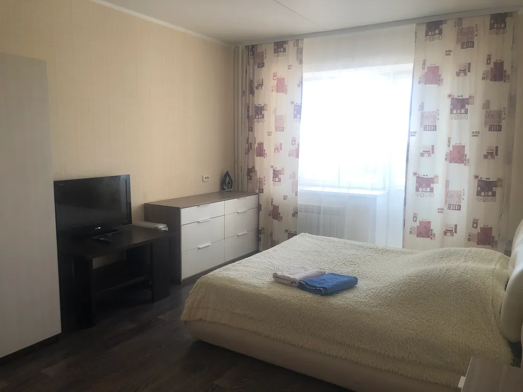 Простор и уют для семьи в центре города с видом на город