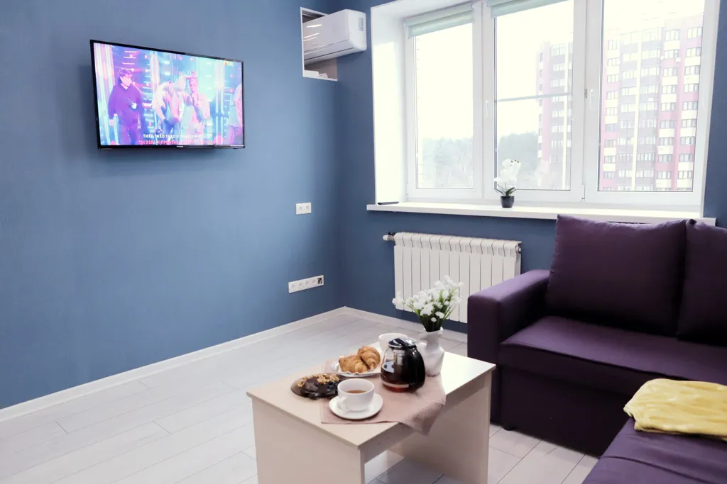 Квартира с необычной планировкой, камином и кондиционером