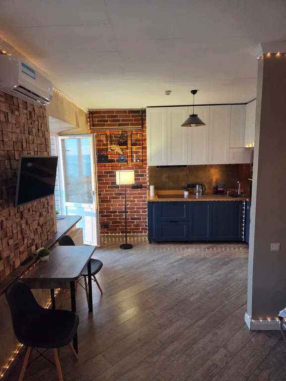 Студия с дизайнерским ремонтом в центре города