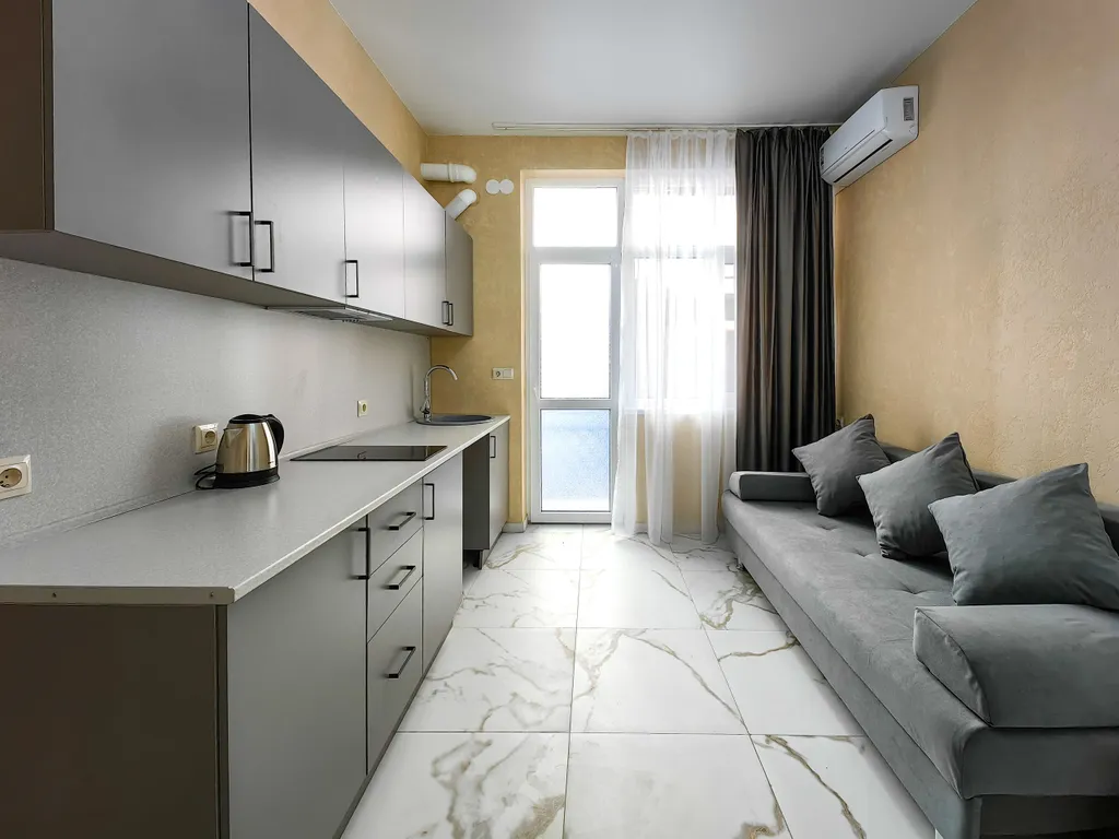 Апартаменты с отдельной спальней и кухней - гостиной