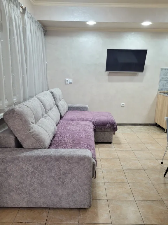 Просторная квартира с двориком в центре города