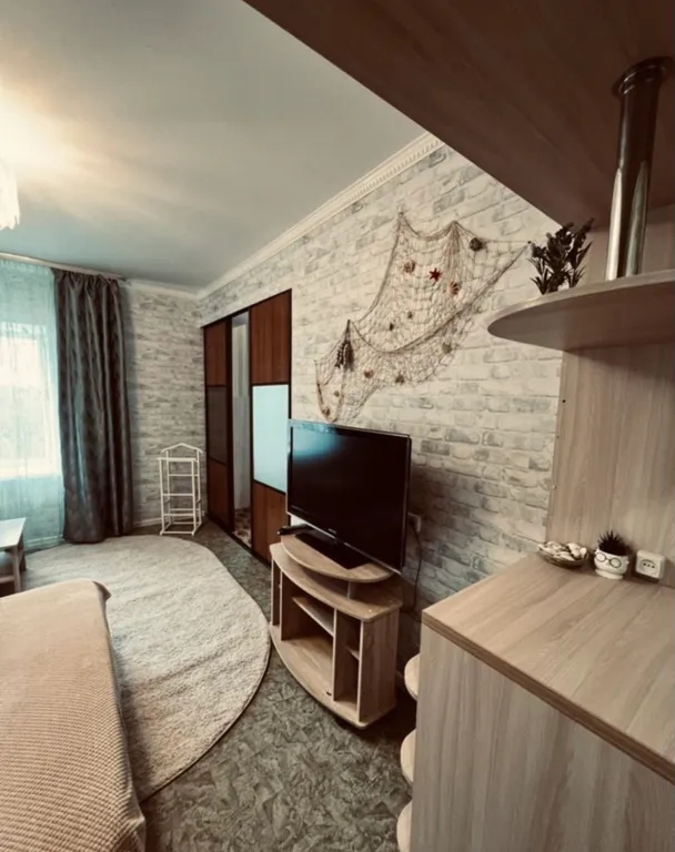 Уютная квартира в спальном районе в доме у реки