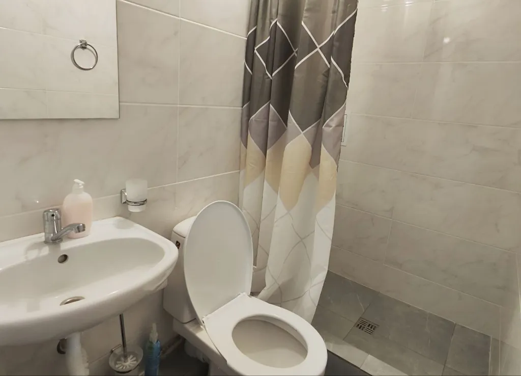 Апартаменты с 1 спальней на мансардном этаже гостевого дома Регион 86