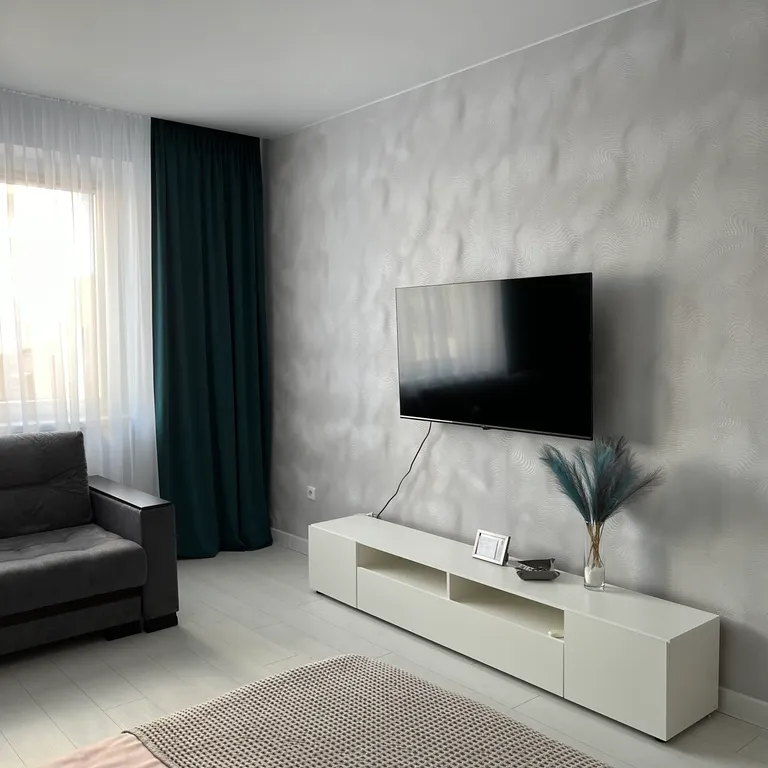 Квартира недалеко от центра в новом доме