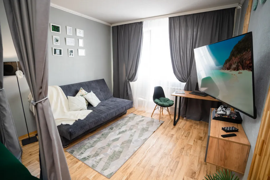 Квартира Апартамент для ценителей уюта с панорамным видом, PS4, СмартТВ-55 — аренда посуточно в Нижневартовск