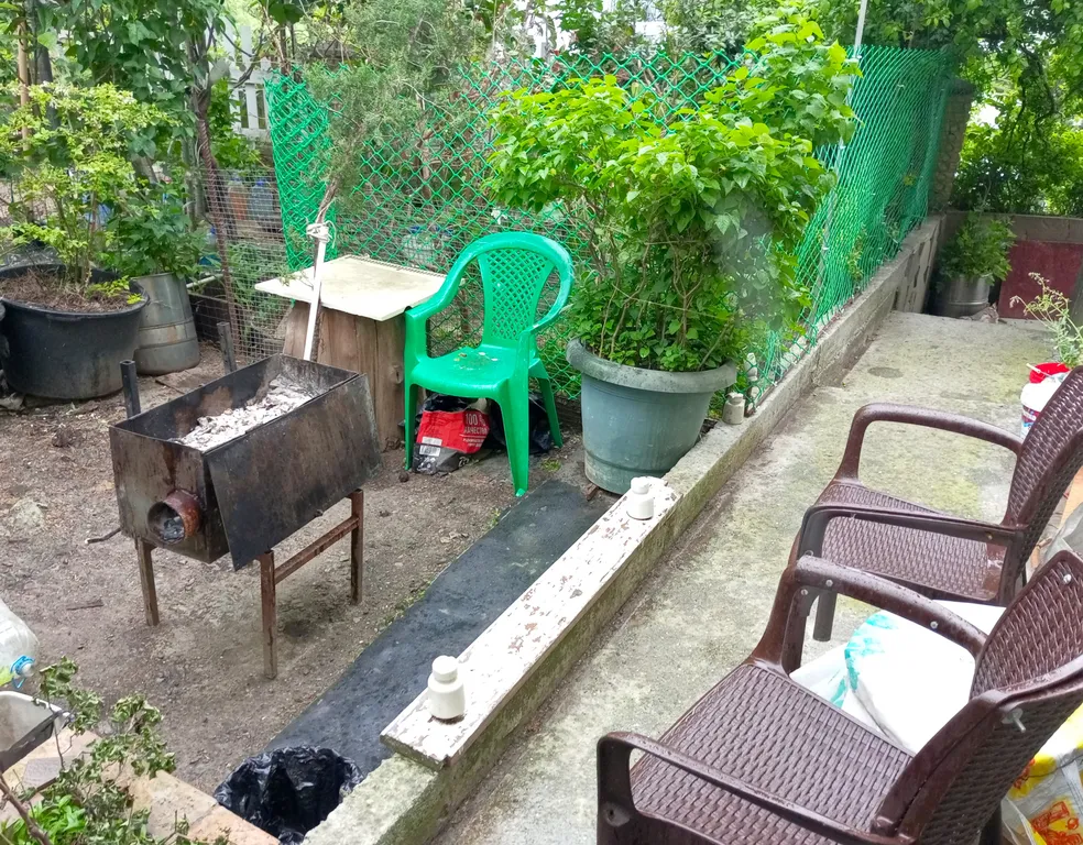 Квартира с мангальной зоной, гаражом и личным местом отдыха во дворе