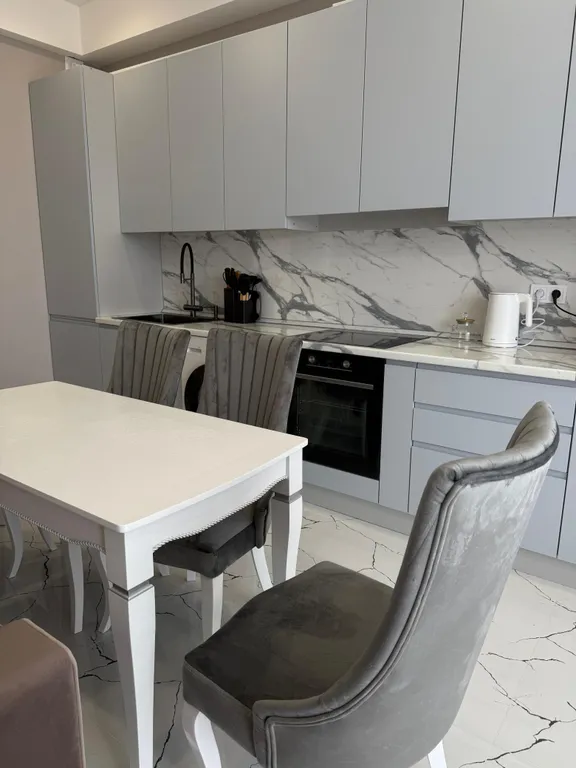 Уютная квартира в центре города рядом с фонтаном, с видом на город