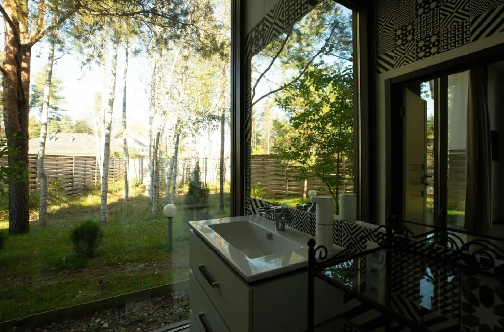 Дизайнерский коттедж с садом на крыше