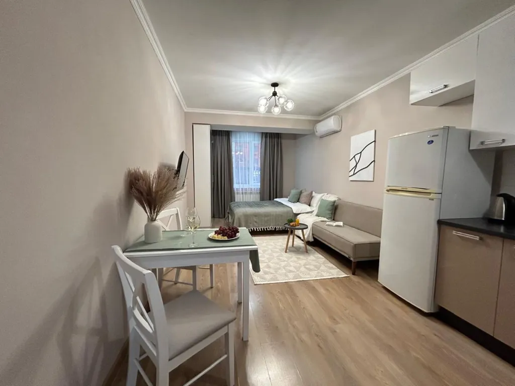 Нежная и уютная студия Кашемир в сердце города