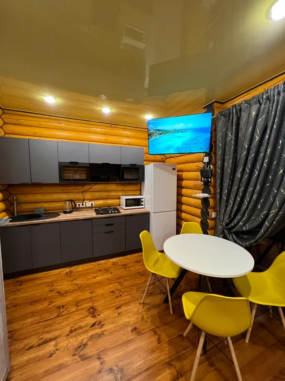 Семейные апартаменты Балдино в доме из сруба