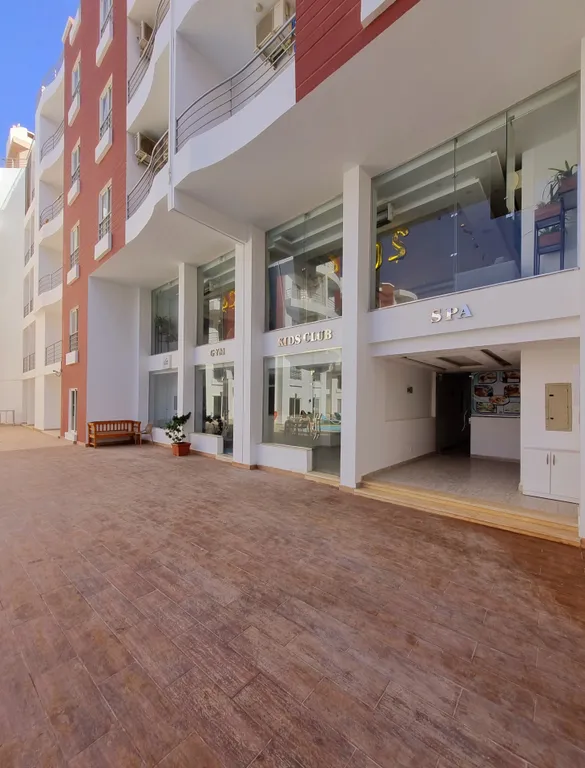 Уютная студия в тихом районе с бассейном и спортзалом в Хургаде