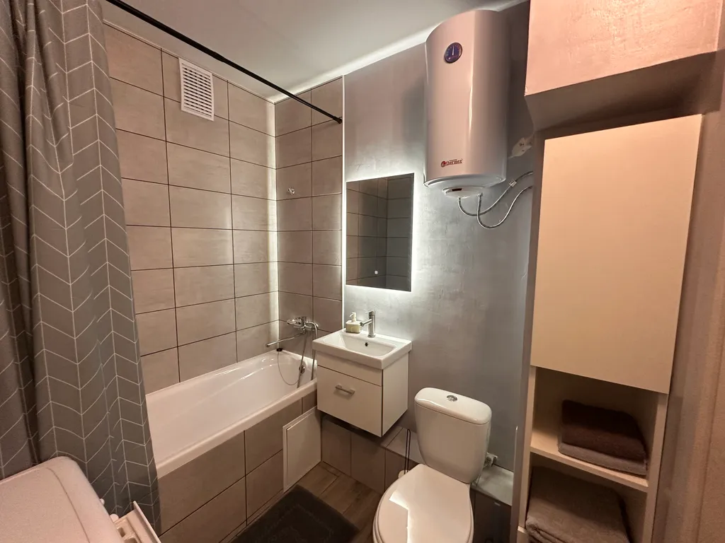 Уютная студия с видом на город