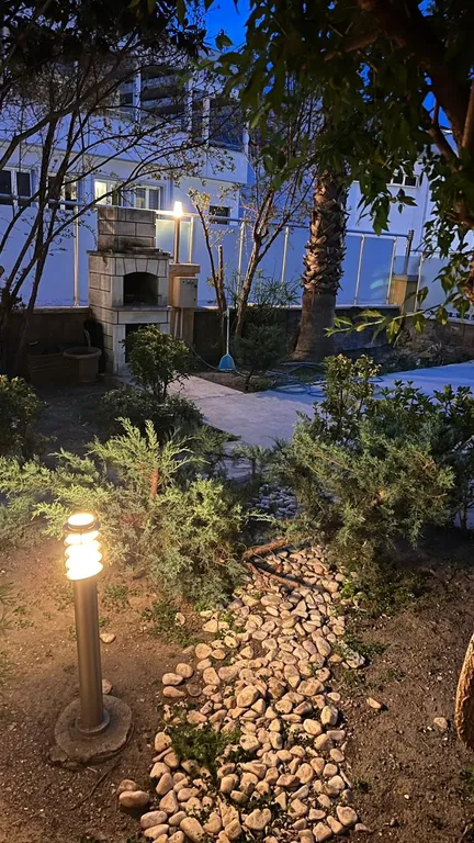 Шикарная вилла с садом и с бассейном в Кемере