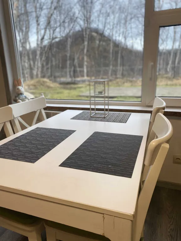 Уютный дом на берегу реки Кола