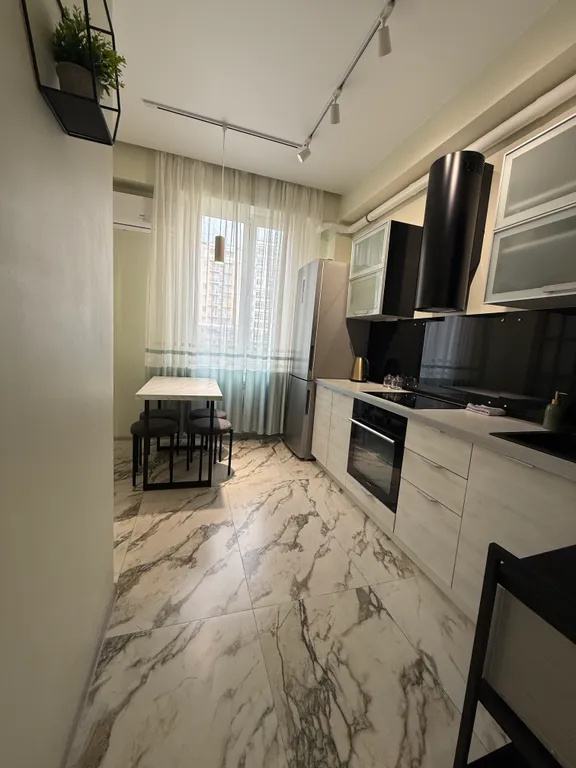 Однокомнатная квартира Четыре сезона