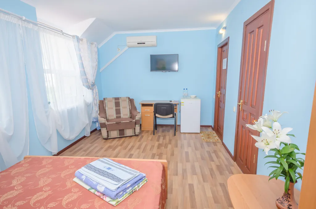 Двухместный Стандарт с двуспальной кроватью и дополнительным местом