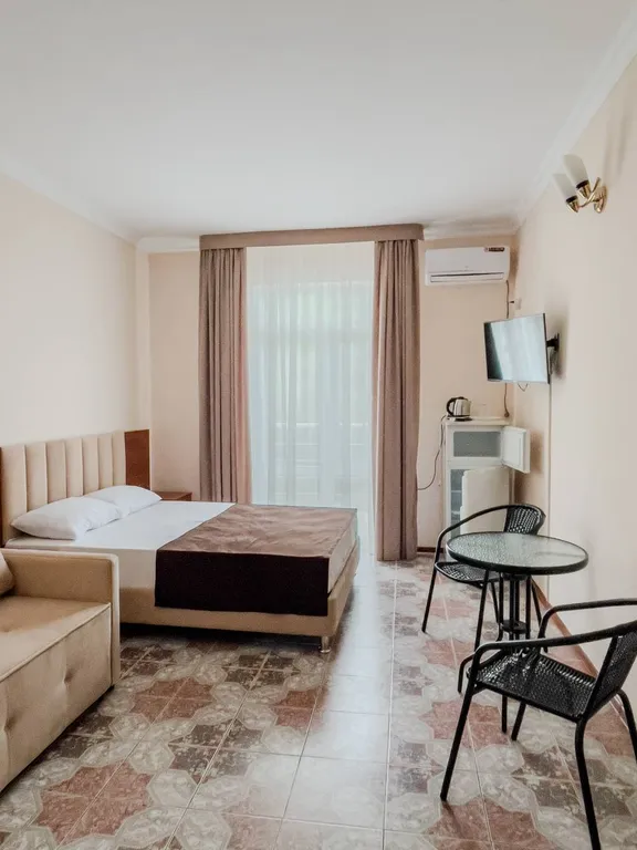 Трехместный номер с балконом