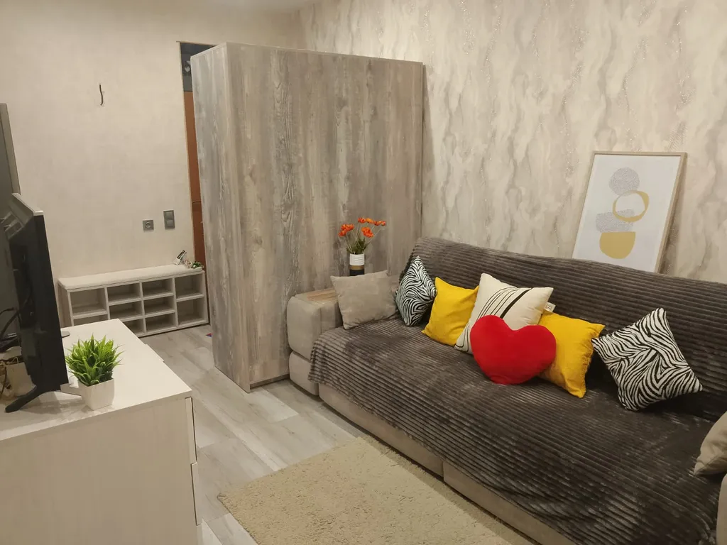 Уютная квартира с высокими потолками