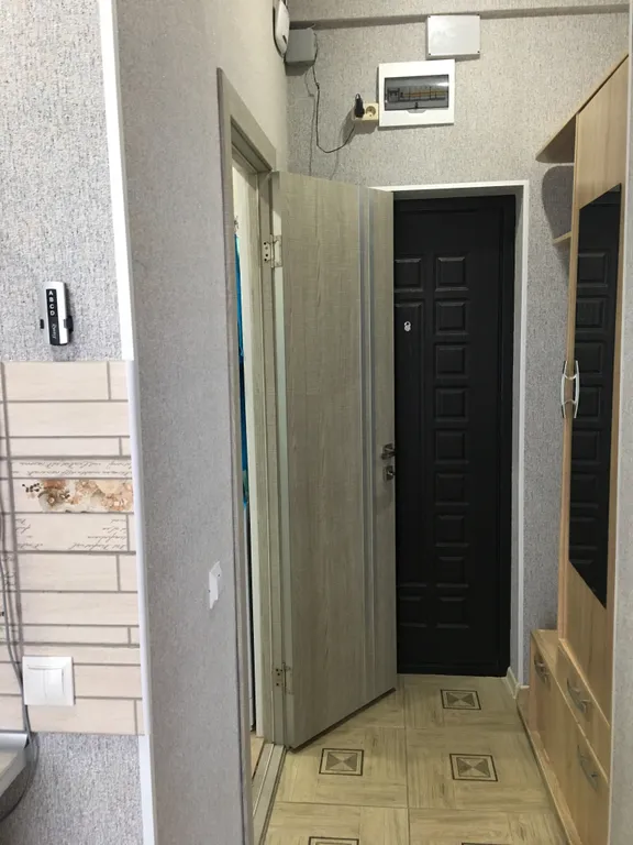 Четырехместная однокомнатная квартира с балконом в центре