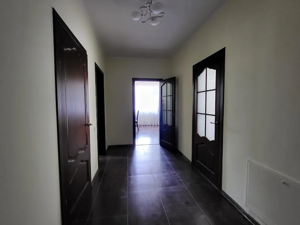 Двухэтажный коттедж на участке 8 соток