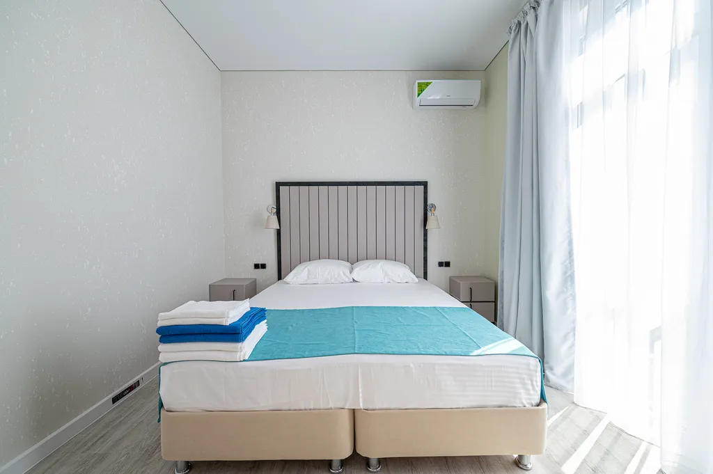 Квартира Квартира Люкс6 с балконом,раздельными спальными зонами и кухней — Дюрсо