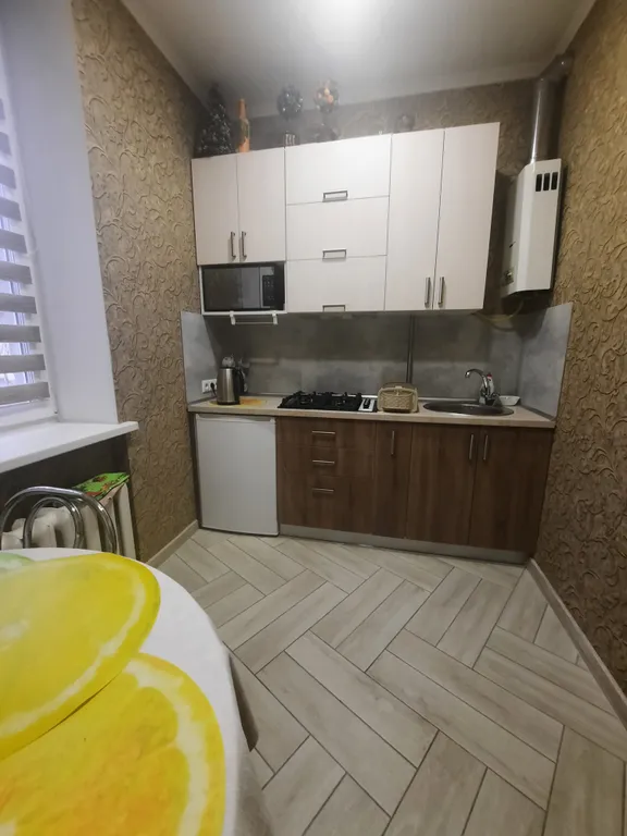 Уютная квартира в центре города с высокими потолками