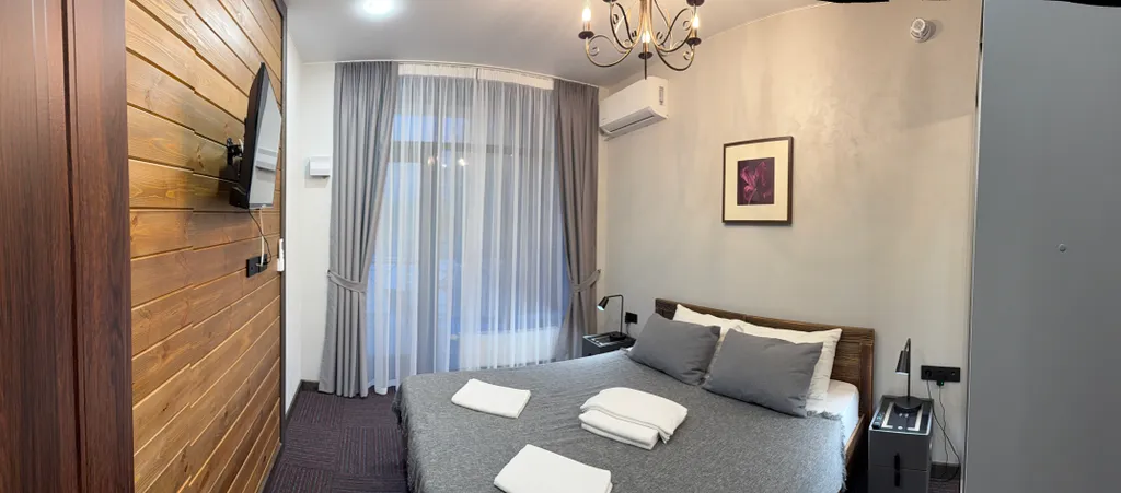 Семейный апартамент у озера на горнолыжном курорте Солнечная Долина